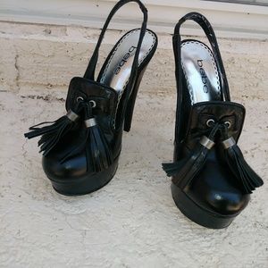 Pair of womens black platform heels